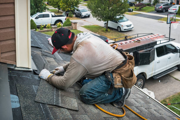 Professional Roof Replacement technician working in Lenore, ID